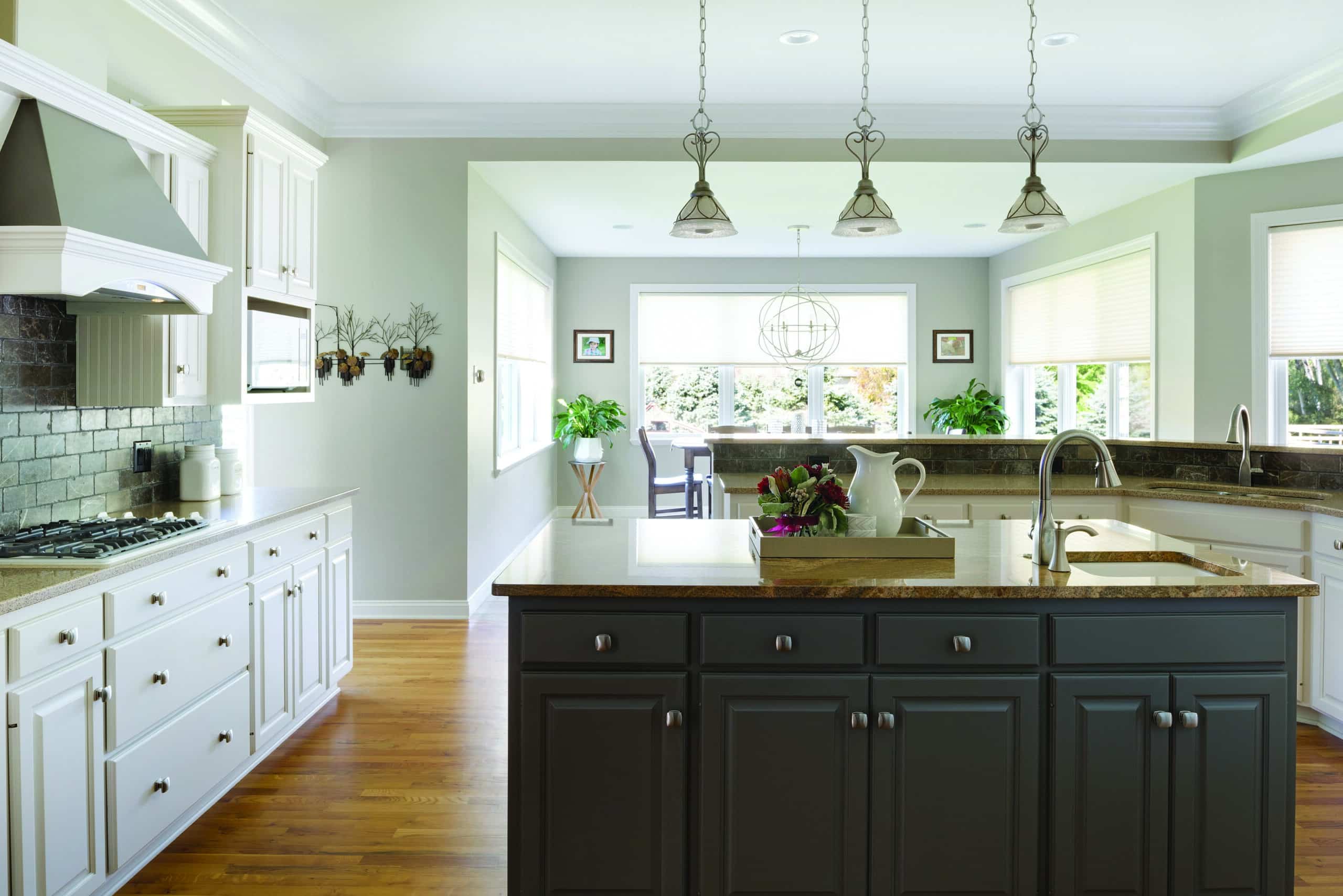 Kitchen Remodel featuring contrasting cabinet colors