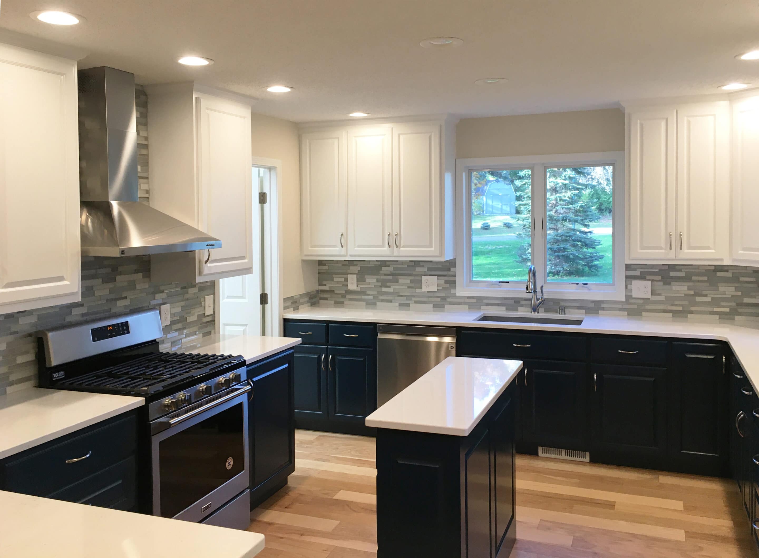 Kitchen remodel featuring contrasting cabinets